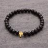By Gabay, Armbånd med træperler og Guldkors, Ø 21 cm